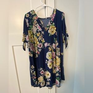 Tunic style dress with a floral design.